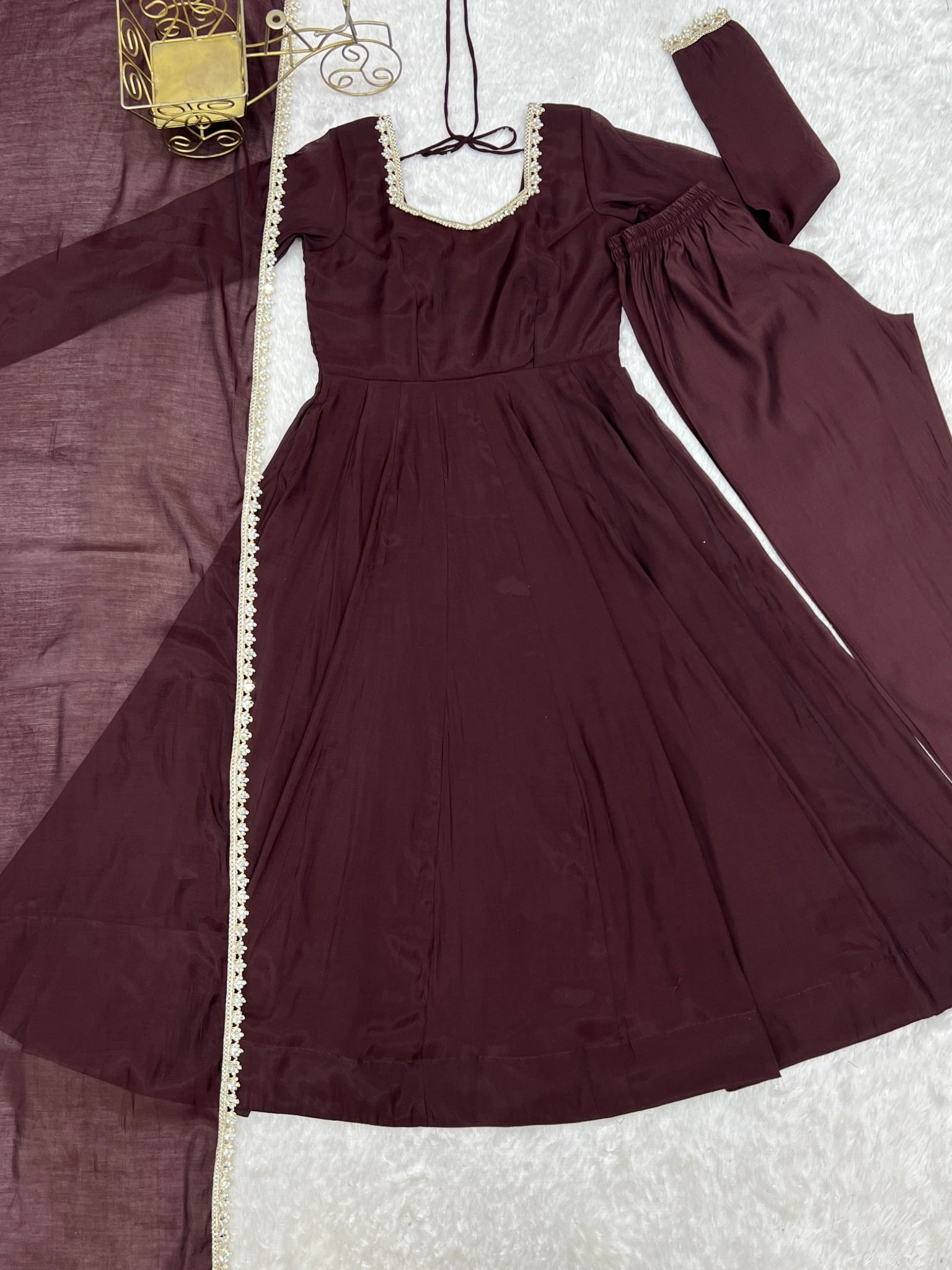 Dark Brown Handwork Anarkali suit flat lay with gold lace neckline and dupatta